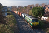 201 Class locomotive No.231 brings a well loaded Ballina to Dublin IWT liner past Claude Rd. The majority of the &#39;Intercity&#39; 201s have worked the IWT liner at some stage or another.