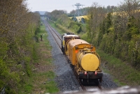 A view looking west towards Drogheda from the road overbridge at the former Duleek Station. This particular section of the Drogheda to Navan line is largely straight with few curves.