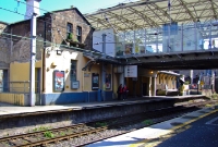 | The station building on the down platform at Dun Laoghaire was constructed in the 1840s by the Dublin &#38; Wicklow Railway on the atmospheric line. The D&#38;WR converted the atmospheric line to convential railway use in 1854. The newest booking office is now located above the lines.