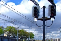 View looking north towards Dublin from the end of the down platform at Dun Laoghaire, with one of the 1983 installed signals in view. These types differ slightly from most of the DART signals, having convential black surrounds.