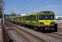 Seen at the same location just north of Dun Laoghaire is an 8-car 8100 Class DART bound for Bray, headed by No.8301. The green footbridge in the background marks the site of &#39;Dunleary&#39; level crossing, which was abolished at the time of electrification in 1984.