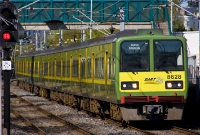 8500 Class DART No.8628 leads an 8-car Japanease built DART set past the former Dunleary level crossing, between Seapoint and Dun Laoghaire. This was also the site of the temporary Dublin &#38; Kingstown Railway terminus of 1834.