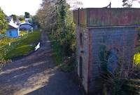 A view looking south towards Clonsilla from the road ovebridge at Dunboyne Station, with the old Midland Great Western water tower visible in this February 2009 shot.