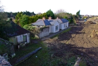 Dunboyne Station, looking north towards Navan from the road overbridge shortly after the line was cleared of vegetation in proporation for reopening. In the foreground can be seen the end ramps of the former up &#38; down platforms.