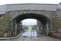 The stone parapets on the road overbridge at Dunboyne Station has since been replaced by a concrete construction seen here. The trackbed in the foreground is been made ready for the relaying of the line.