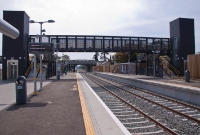 This is the rather elaborate modern footbridge at Dunboyne Station, built to handle the large volume of commuters travelling to and from Dublin. This view is looking south towards Dublin from the up platform.
