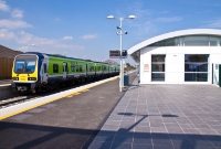 Another 290000 Class railcar, No.29404 departs Dunboyne past the new single storey booking office, located on the up platform. The station is certainly very different to the first one established here in 1862 by the Dublin &#38; Meath Railway, at a time when Dunboyne was a merely a rural village on the line to Navan.
