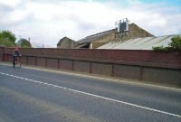This is the parapets of the Ardee Rd bridge, which crossed the Greenore and the Great Northern&#39;s main line. The former Dundalk Works are out of view to the right.