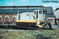 Brand new 121 Class locomotive No.B122 in grey &#38; yellow livery is seen been turned on the turntable at Dundalk Works in 1961. Today the railway sheds behind are now utilised by Bus Eireann. ©John Camp