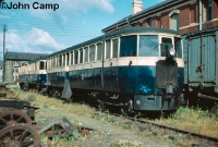 Ex GNR diesel railcars Nos.C1 &#38; C2 , built in 1935, are seen stored at Dundalk Works in 1961. The track the railcars are stored on is the remains of the D&#38;GR line on the approach to the square crossing, which was sited behind them in the background. ©John Camp
