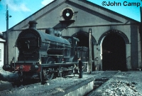 An ex GNR SG3 Class 0-6-0 is seen on shed at Dundalk Works in 1961, these were the most powerful 0-6-0 locomotives to run in Ireland. The shed is now bricked up and used by Bus Eireann. ©John Camp
