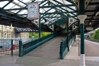 Dundalk is a fine example of GNR architecture. The station is unique in having a long centre island platform with footbridge connected to the main buildings on the left. This layout is more common at UK stations, but certainly not in Ireland.
