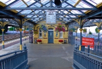 The nice approach to the island platform at Dundalk Station from the footbridge ramp. Note the ornate railings and posts also.
