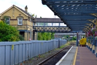 The main booking office at Dundalk Station can be seen in its elevated position on the left, with the connecting covered footbridge to the island platform.