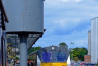 A present day view at roughly the same location as the previous photo sees the modern &#39;Enterprise&#39; service standing beside the sole remaining water tank at Dundalk Station. A car park on the right now occupies the once extensive sidings on the up side of the station.