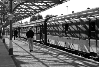 The 1960s Sheffield built Craven coaches are viewed on the down platform at Dundalk Station. The nearest vehicle is an ex British Rail built Mk1 generator van which provides heating to the coaches.