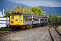 Dating from 1975, Northern Ireland Railway&#39;s 80 Class railcar No.8090 brings an Modern Railway Society of Ireland railtour into Dundalk Station, operating from Belfast prior to the withdrawal of these units from service.