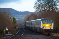 Having climbed over the gradients in the border region, the other &#39;Enterprise&#39; DD set lead by No.9002 and propelled by 201 Class loco No.207, approaches Dundalk with the first morning service to Dublin.