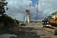 This is a view looking north towards Dublin City at the former Dundrum railway station. In the distance is the new Luas line bridge nearing completion. In railway days the original bridge here was a much smaller affair.