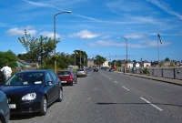 This was the site of Ireland&#39;s widest railway level crossing, where the former Mallow to Waterford line crossed diagonally the main N25 road in Dungarvan town. Today there is little trace of the level crossing apart from the trackbed on either side of the road.