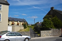 This was the site of the most eastern level crossing in the Dungarvan town area, located just beyond the N25 crossing. The former trackbed along here towards Waterford has been retained and is now a public footpath.