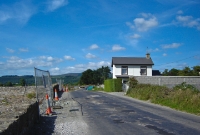 Another view of this former level crossing east of Dungarvan on the former Mallow to Waterford line, this time from the road side of the crossing. The hump in the road where the track once crossed is still evident here.