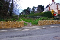 The former levelcrossing at Dungriffan Road, looking south towards The Summit of the Hill of Howth. The tramway is now a pathway.