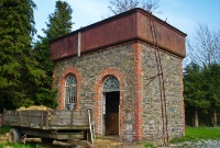 The large stone built water tower also survives at Dunlavin Station, complete with tank and step ladder.