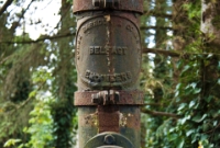 As can be seen, the water crane at Dunmanway Station remains very much intact, having been disused since 1961. Since closure of the railway, a group of trees have grown up on the trackbed at the west end of the station.