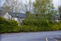 Dunmaway station building, as viewed from what was the down platform, now long since demolished. A car park serving an ESB office now occupies much of the former station site.