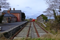 Dunsandle Station in March 2008, with recently relaid track. Both the station building and stone built goods store have been pleasingly restored.
