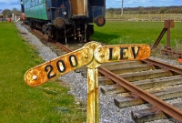 Gradient post, possibly of Midland Great Western origin, is seen at Dunsandle Station.