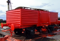 A standard CIE open wagon, designed by Oliver Bullied at Inchicore Works, Dublin, is seen at Dunsandle Station shortly after repainting.