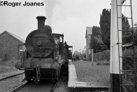 Seen at the north end of Dunsandle Station is ex Midland Great Western J19 Class 0-6-0 No.610, working the branch service from Loughrea to Attymon in September 1960. ©Roger Joanes