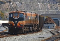 071 Class loco No.080, dating from 1976, is seen on a timber train in Waterford West yard. Timber traffic from Ballina, Co.Mayo, is unloaded at the terminal here for Coillte forestry.