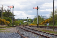 Wellingtonbridge, looking west towards Waterford, showing the &#39;up&#39; starting semaphore signals. The mileposts on the line are measured from Mallow via Fermoy, a route which closed as long ago as 1967.