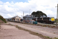 A view of the RPSI&#39;s &#39;South Wexford&#39; railtour at Wellingtonbridge Station. In the foreground is the site of the former beet loading plant.