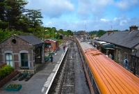 Westport Station, looking west towards the quay and Achill. The station buildings here date from the opening of the line in January 1866. In the distance is the former stone built goods shed, as well as the locomotive shed.