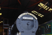 Great Northern Railway V Class compound 4-4-0 loco No.85 &#39;Merlin&#39;, is seen stored at Whitehead, complete with &#39;Enterprise&#39; headboards. No.85 was built at Dundalk Works by the GNR in 1932.