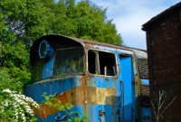 Nature is slowly taking over No.101 at the back of the RPSI yard at Whitehead. After some years of storage the forlorn looking loco was eventually disposed of.