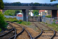 At the north end of Whitehead Station is the connection to the RPSI base, which diverges to the right in this view. A fence and gate surrounds the base for protection from vandals.