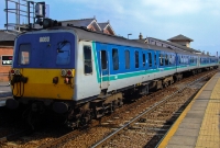 The other 80 Class power car on the ITG railtour is No.8069, is seen at the north end of Whitehead Station. These units originally entered service in a striking blue and maroon livery.