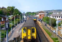 450 Class railcar No.8783 departs Whitehead with a service from Larne Harbour to Belfast. No.8783 entered service in December 1985.