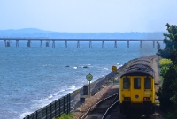 450 unit No.8453 is seen entering the single track section on the rear of this Belfast bound 450 Class set, as viewed from the footbridge at the south end of the station.