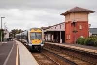 Spanish built 3000 Class railcar No.3019 forms the rear unit on a Belfast to Larne Harbour service, seen departing the down platform at Whitehead Station. The CAF built units entered NIR service in 2004.