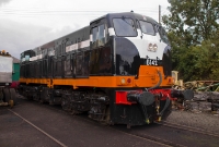 Repainted into CIE&#39;s original black &#38; tank livery, 1962 built 141 Class loco No.B142 stands outside the shed at Whitehead during the &#39;Summer Steam&#39; open day.