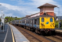 Refurbished 80 Class railcar No.8090 stands at the head of an Irish Railway Record Society special at Whitehead, operating from Larne Harbour to Bangor. The 80 unit at the rear is No.8094.