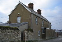 This is the building which belonged to a former chemical plant, adjacent to Wicklow Jct. The Dublin South Eastern Railway built a siding on the up side of the line to serve it.