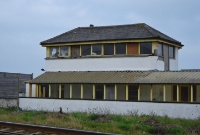The large 1877 built DWWR signal cabin, which controlled Wicklow Junction. It was taken out of use by the GSR in 1927. After many years of disuse, the line leading into the Murrough Station was removed in 1988.