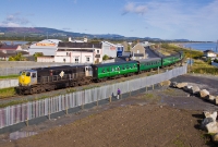 The level crossing at the former Wicklow Jct has since been replaced by a new overbridge, from where this view of 071 Class loco No.073 is obtained, operating the Railway Preservation Society of Ireland &#39;Best of Both&#39; railtour to Arklow.